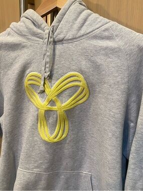 Aritzia Light Gray Hoodie with Neon Yellow TNA Logo. Size XL.